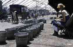 Circus performers' buckets waiting to be filled